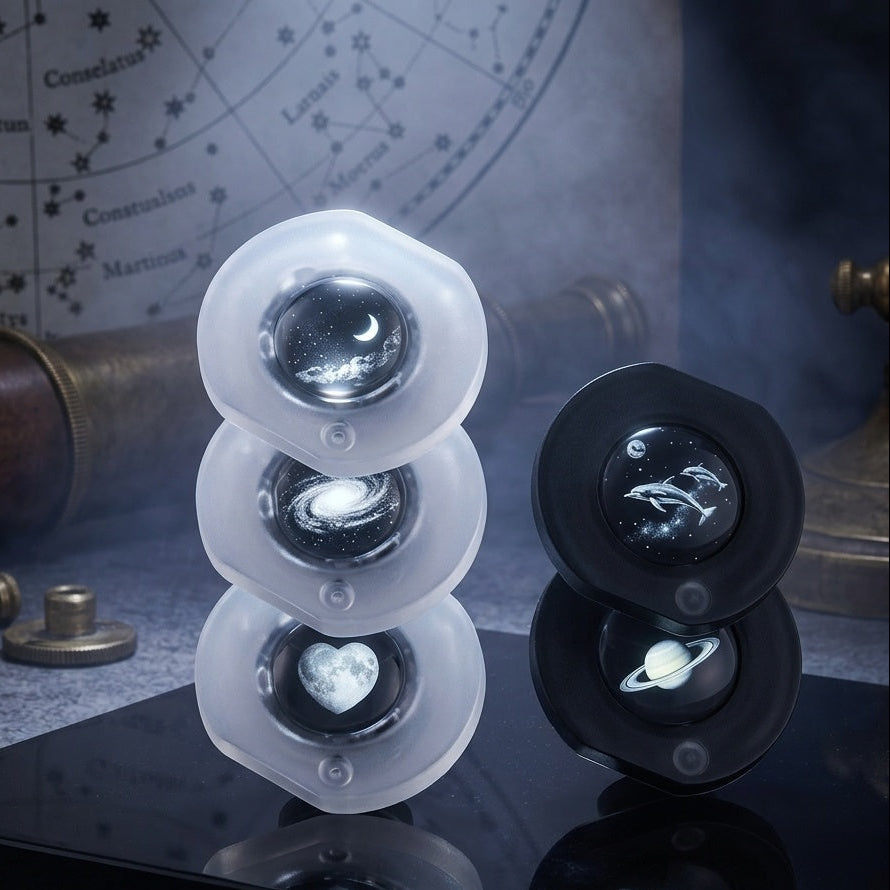 Decorative items with celestial designs on a dark surface, including a telescope and star map.